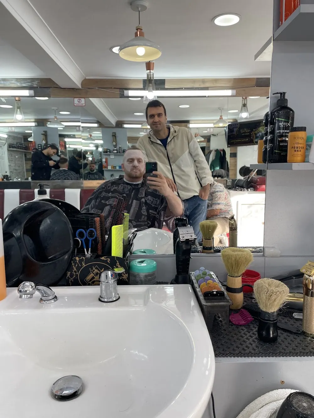 Barbers cutting in the white room